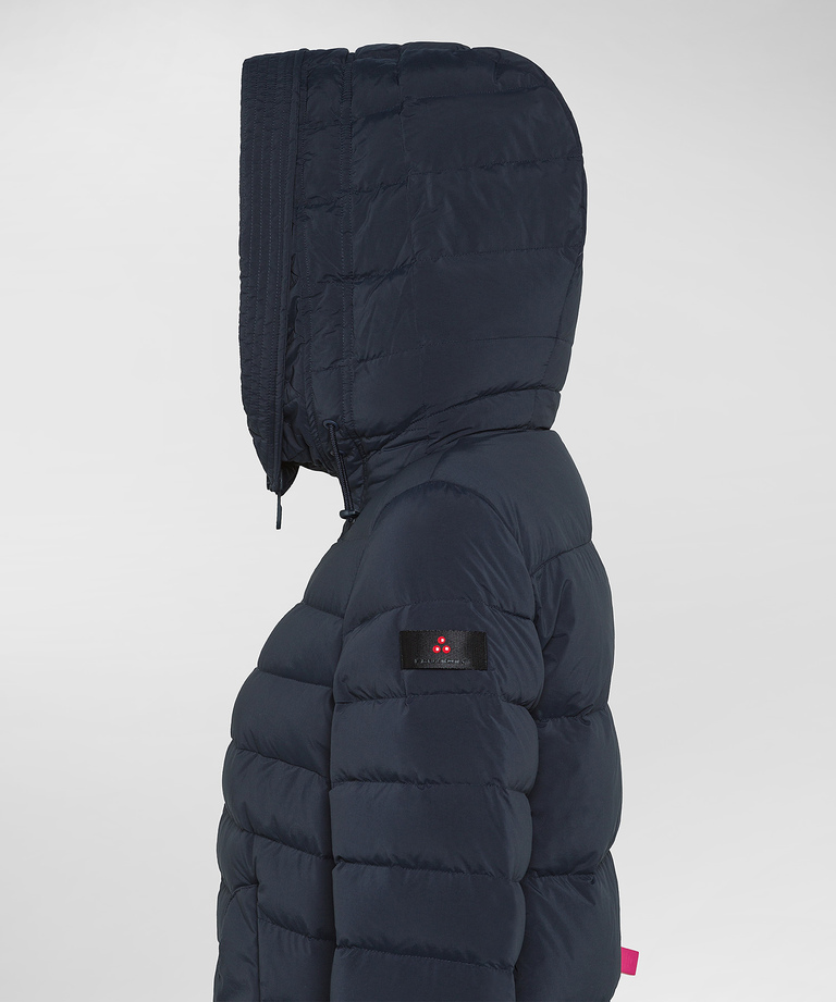 Long down jacket with fur in color tone