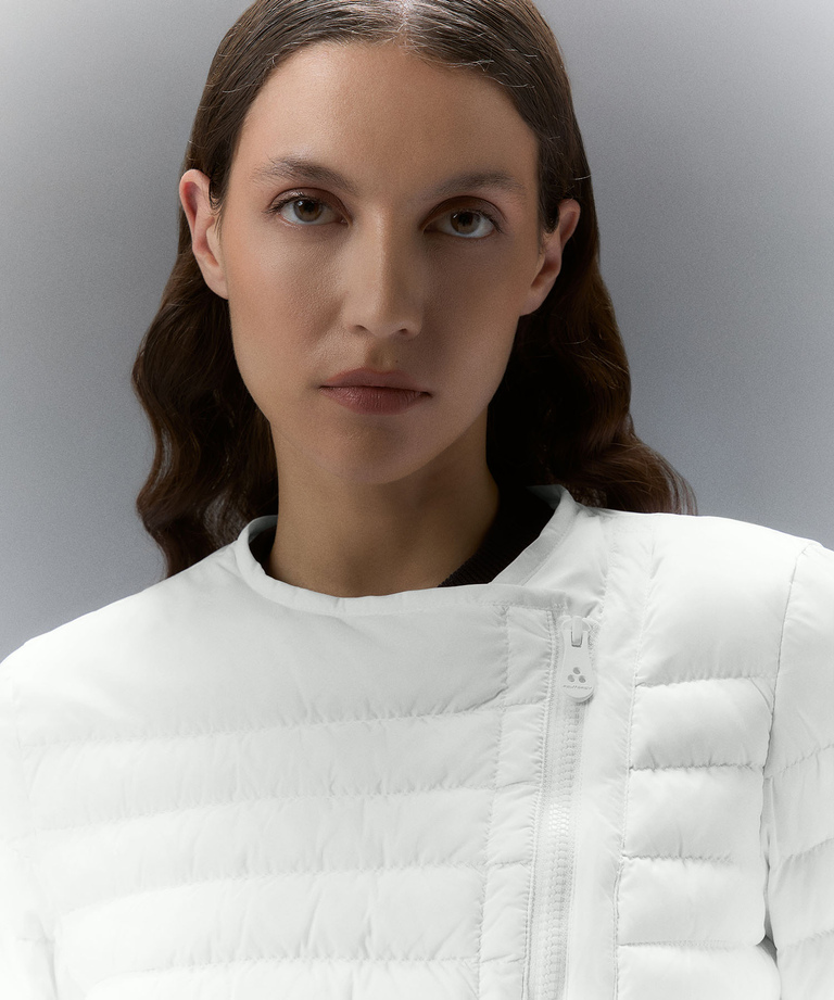 Waisted down jacket with slanted zip