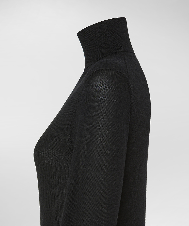 100% virgin wool mock-collared sweater