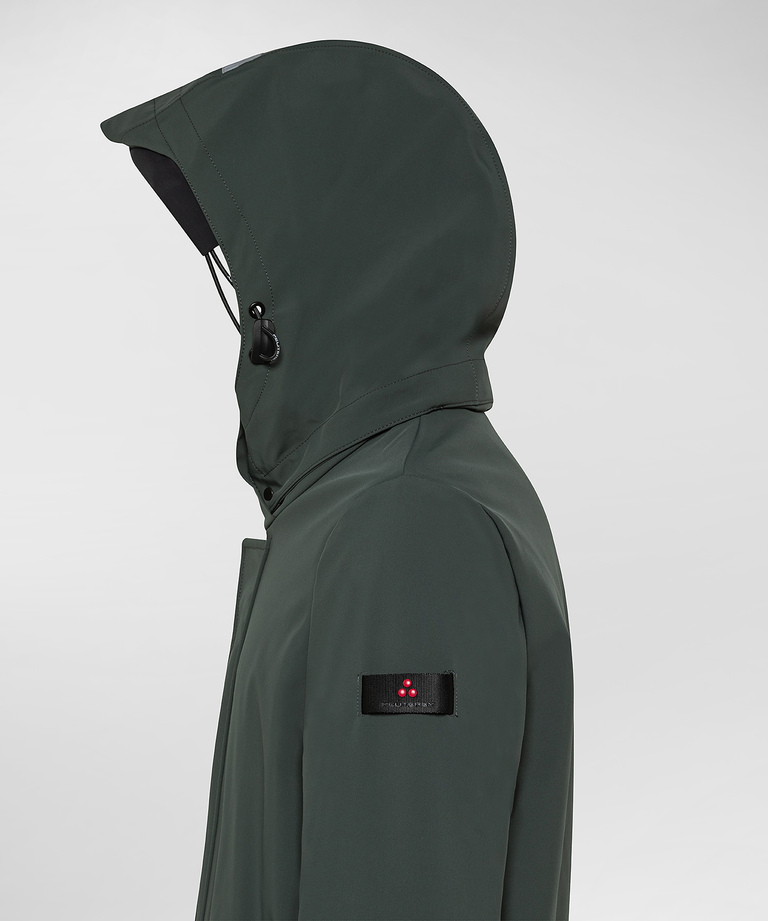 Minimal, technical three-layer trench coat