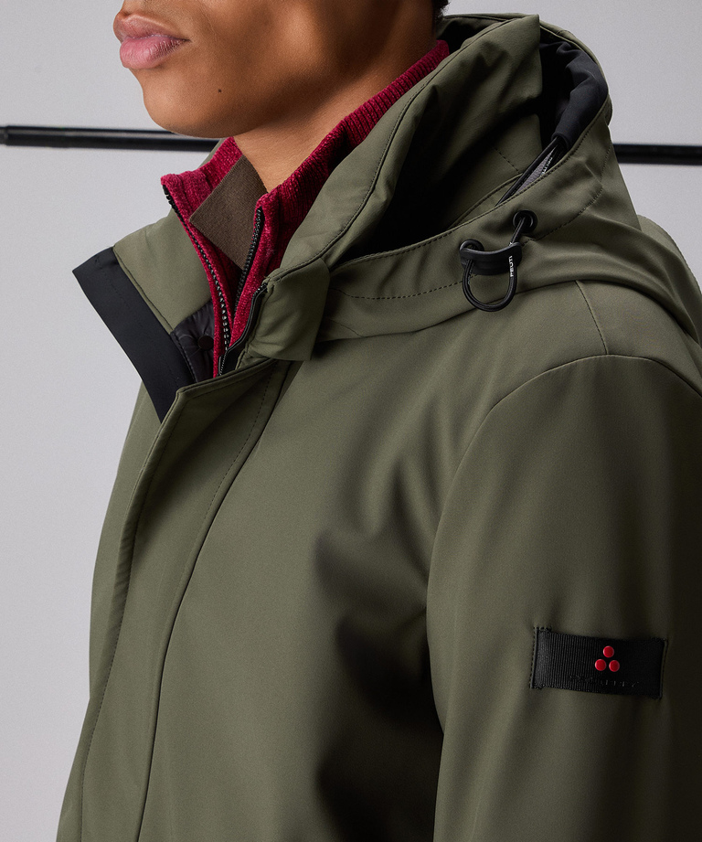 Minimal, technical three-layer trench coat
