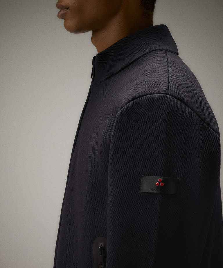 Performance sweatshirt with heat seals