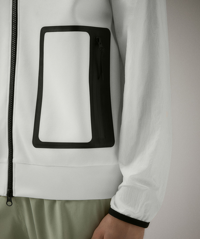 Double fabric performance jacket with black piping