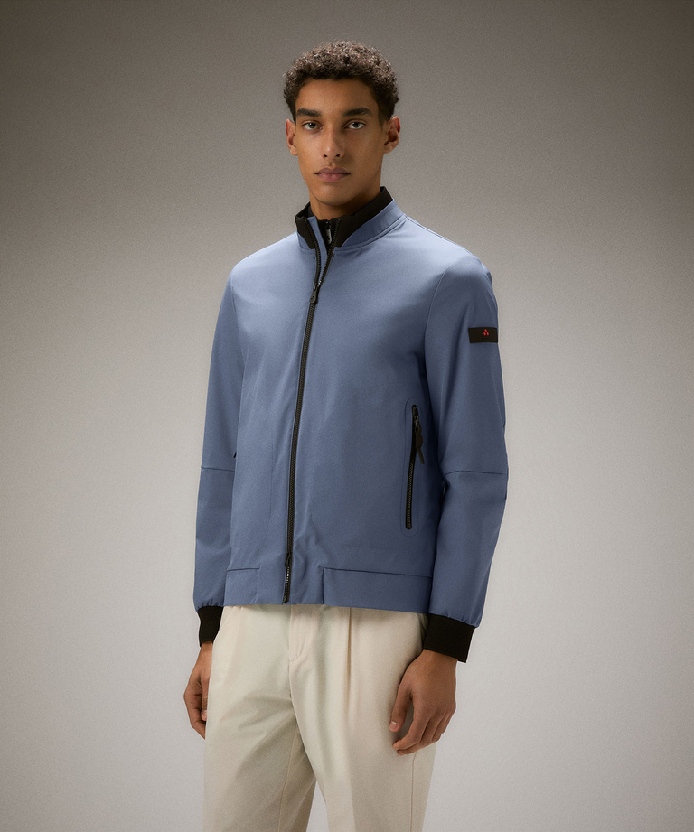 Windproof jacket with elastic details