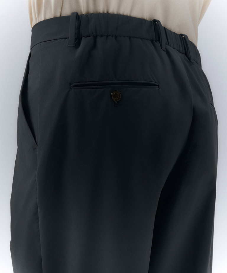 Polyester fabric trousers with essential details