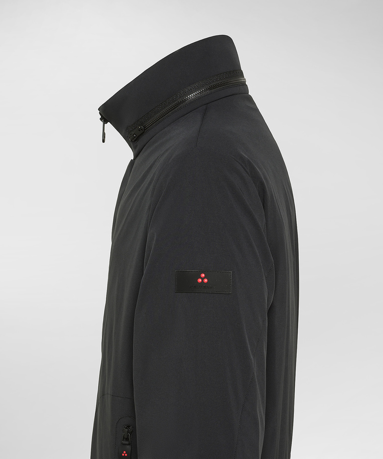 Stretch jacket with pull-out hood