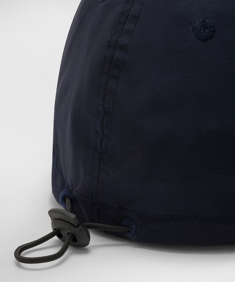 Baseball cap with embroidered logo